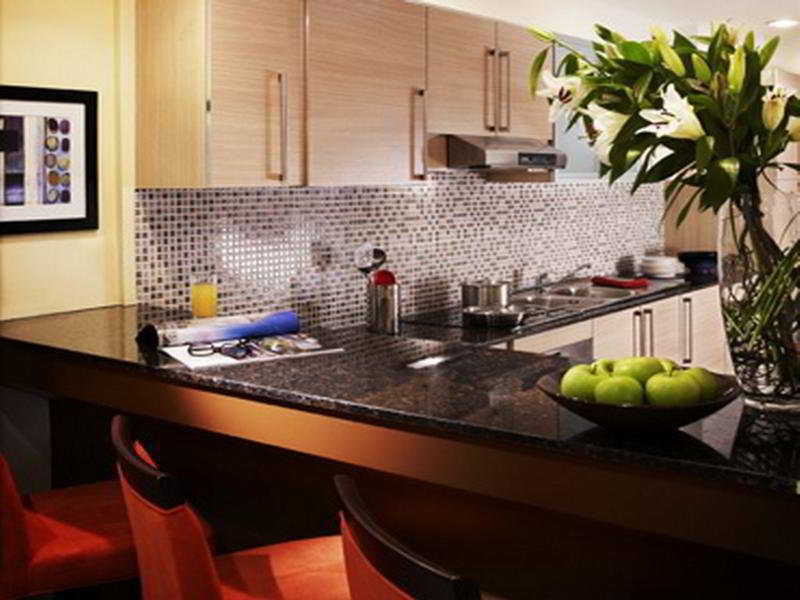 Somerset West Bay Доха Стая снимка A kitchen at The Standard East Village